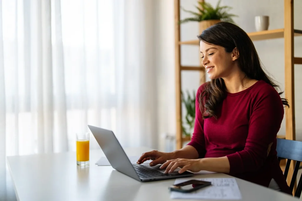 Happy professional woman making an NDIS referral