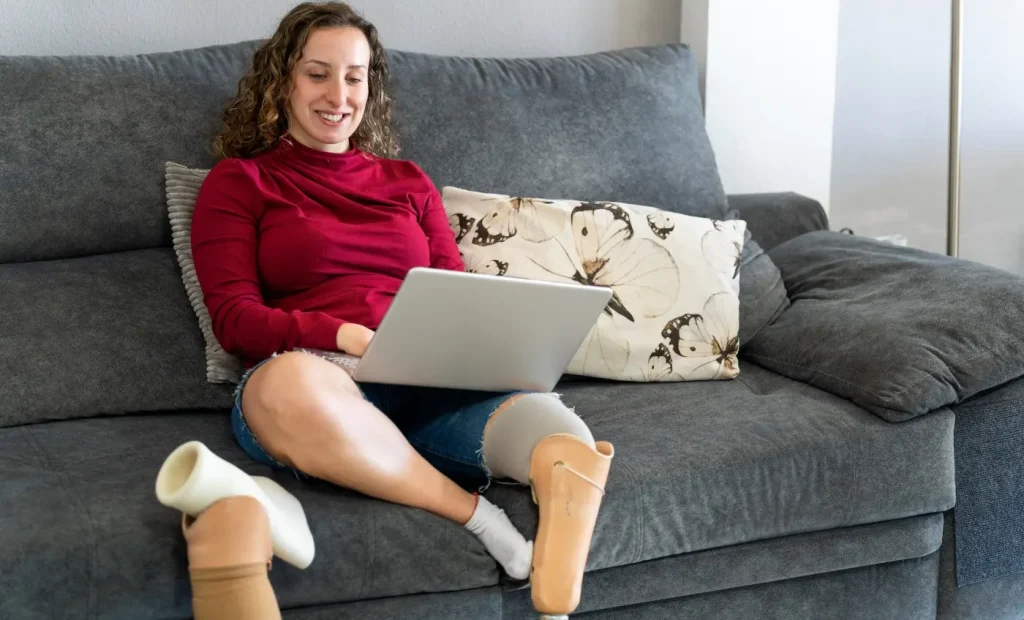 Disabled woman using laptop